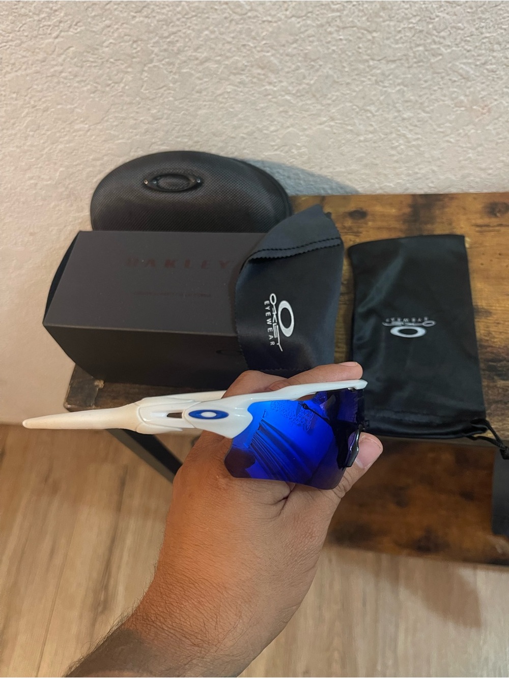 Oakley White Frame Sunglasses with Blue Mirror Lenses